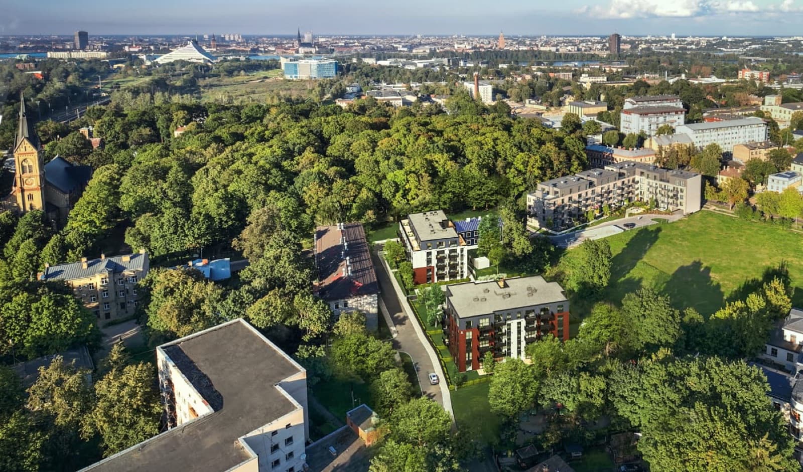 Bordo Rezidences — aerial view of the development in Torņakalns, with Riga's skyline beyond.
