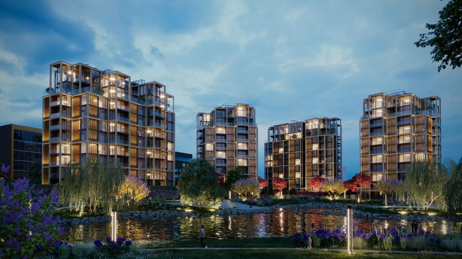 Skanstes Street 48 — the towers at dusk, reflected in the water.